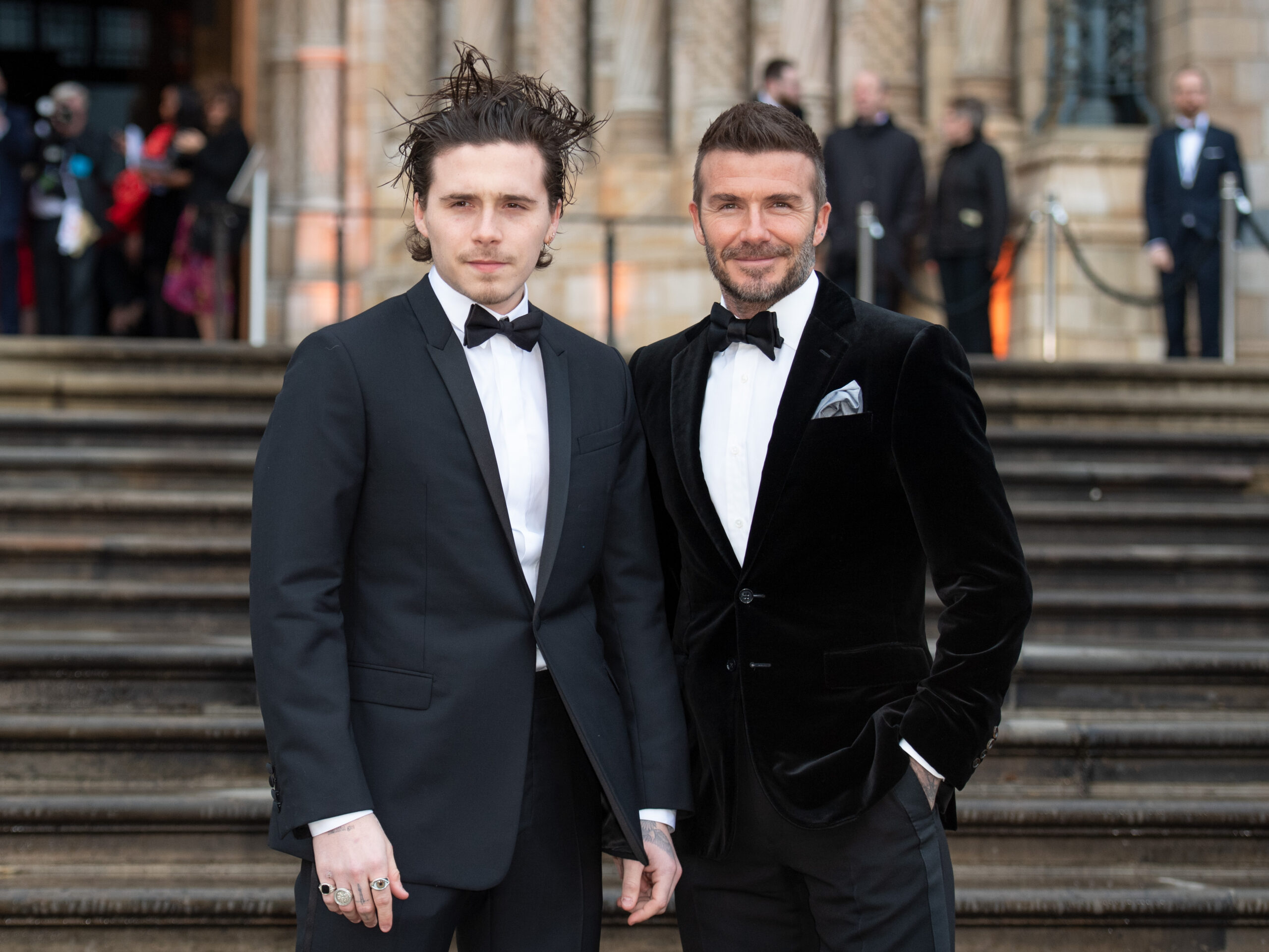 Brooklyn and David Beckham at event