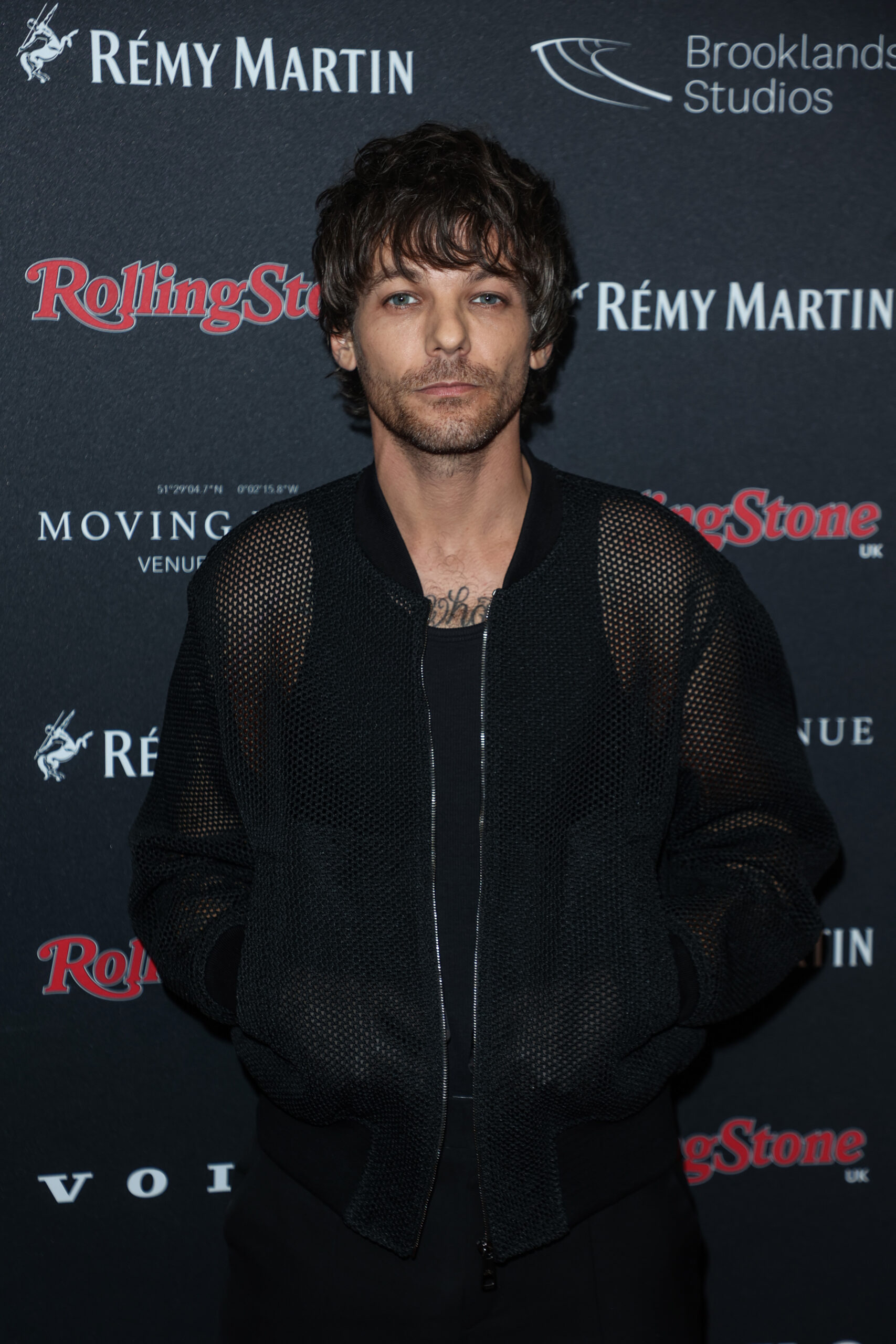 Louis Tomlinson on the red carpet 