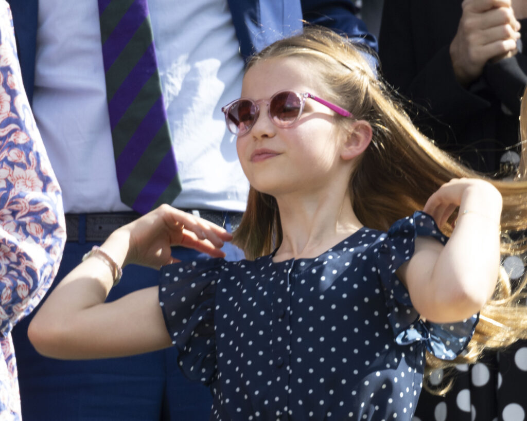 Princess Charlotte posing in sunglasses at Wimbledon