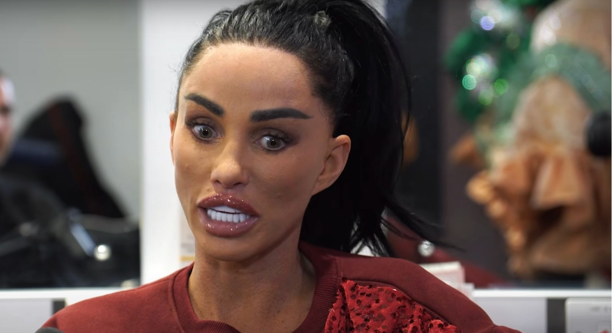 Katie Price speaking on a podcast
