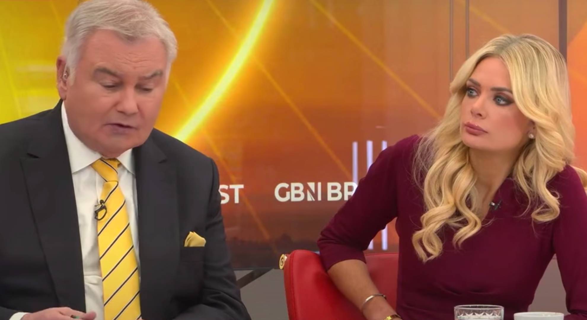 Eamonn Holmes looks downwards