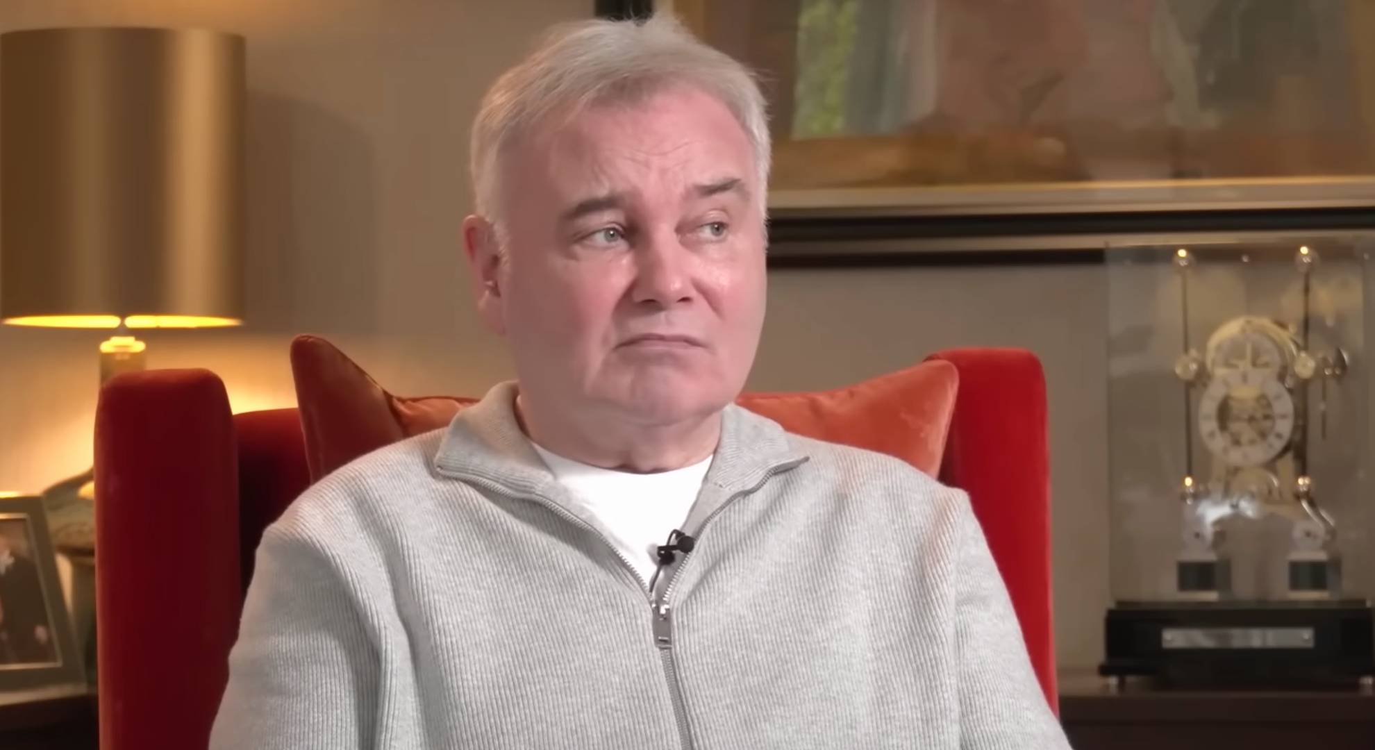 Eamonn Holmes looks to his side