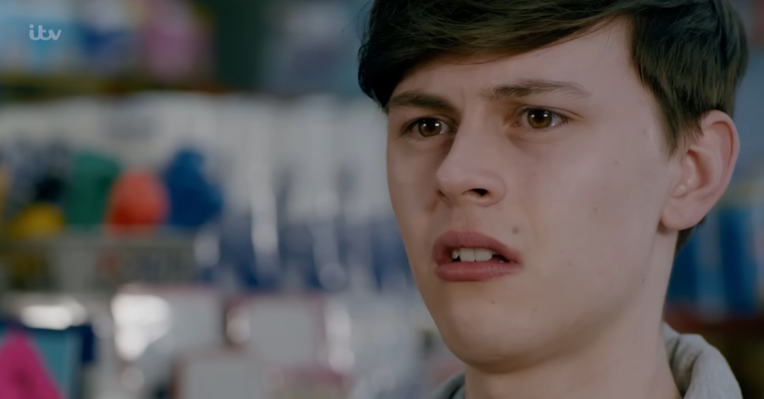 Young Kit looks disgusted on Coronation Street