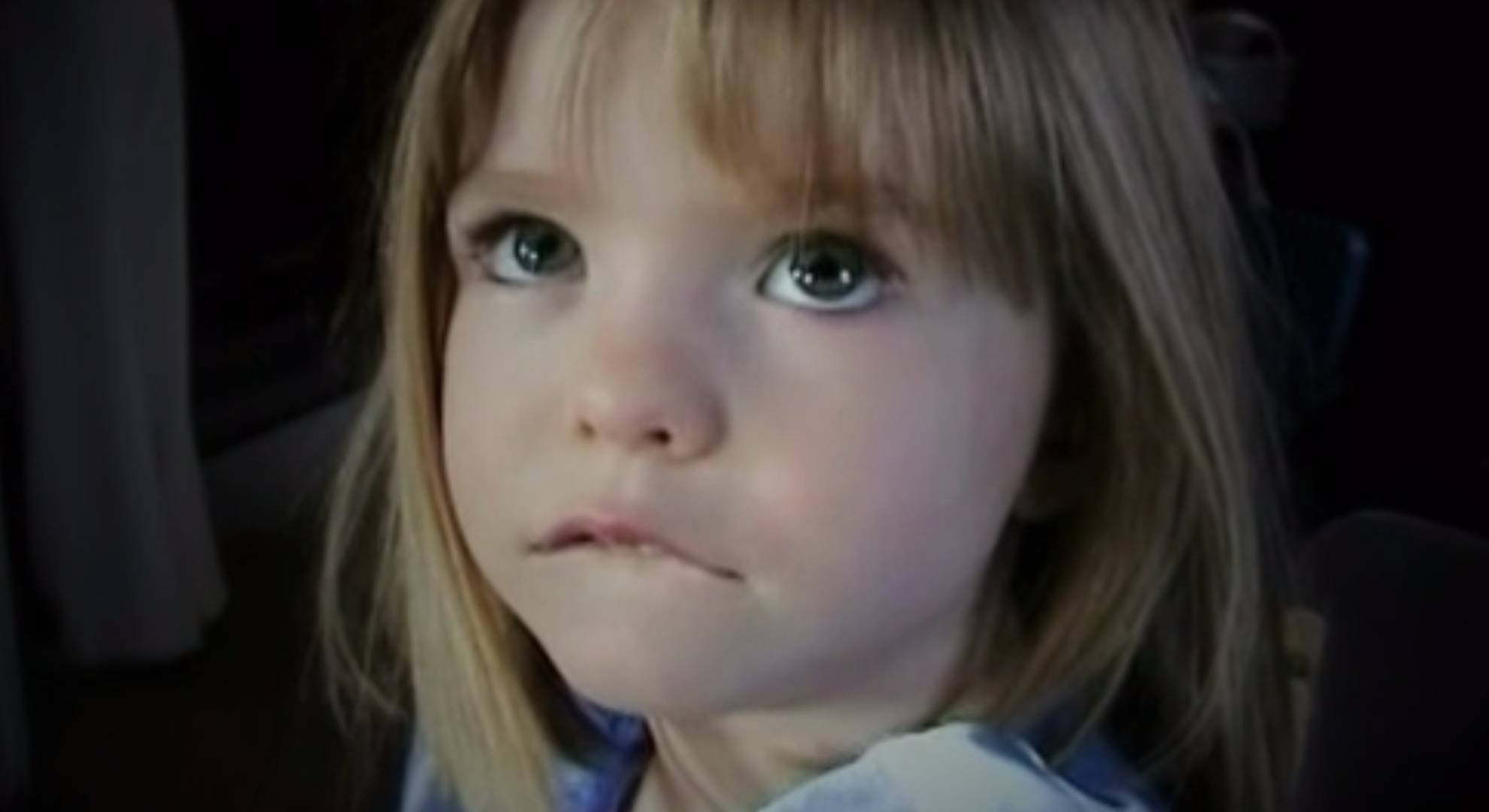 Madeleine McCann looks upwards