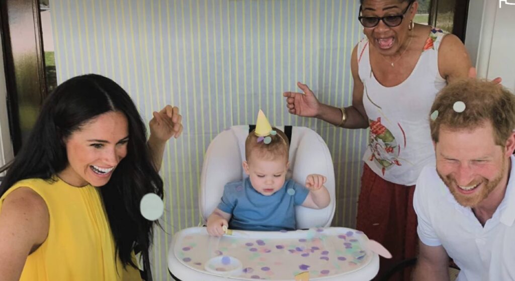 Meghan Markle, Doria Ragland, and Prince Harry play with Prince Archie