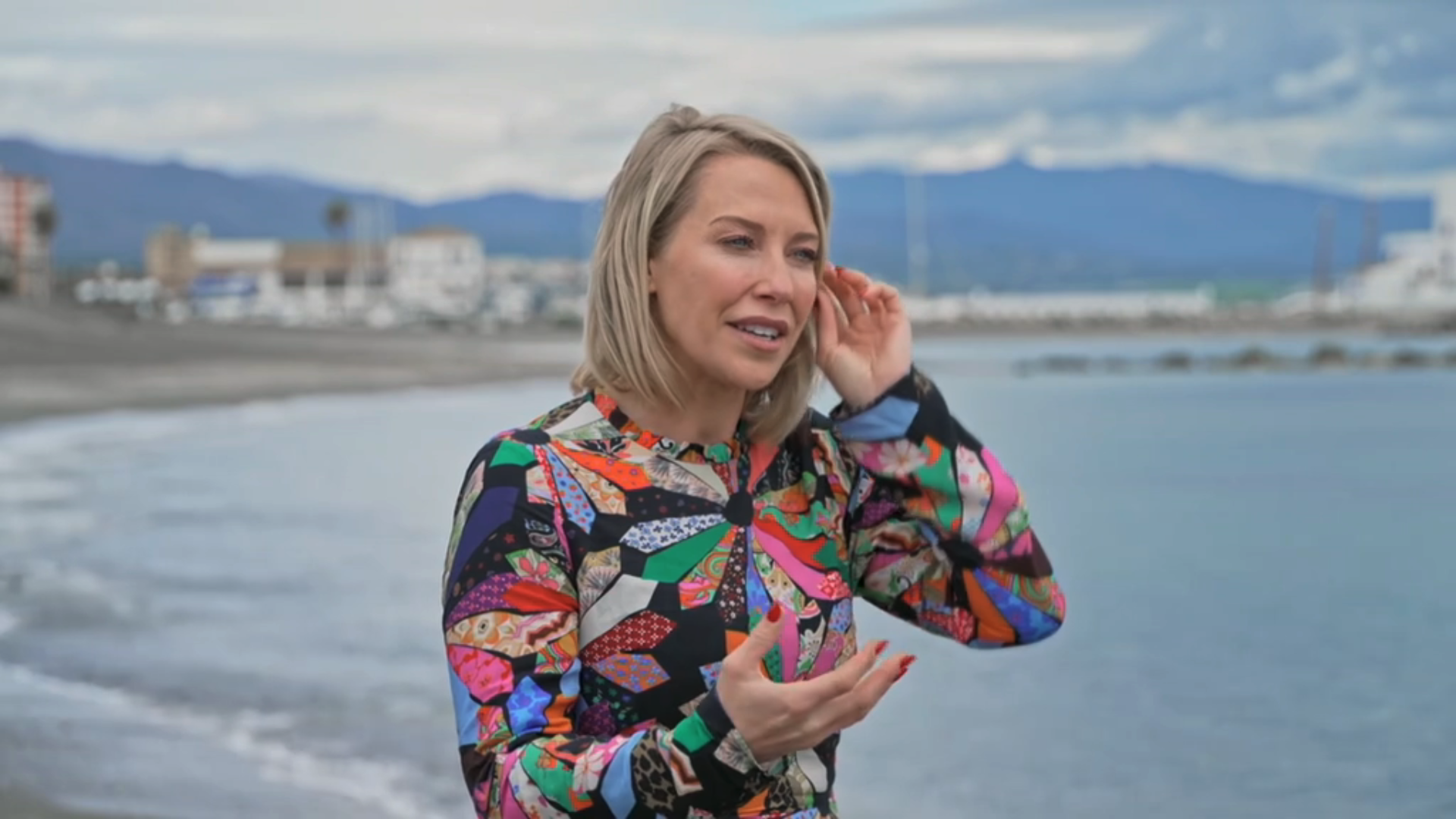 Laura Hamilton in a patterned dress on A Place in the Sun