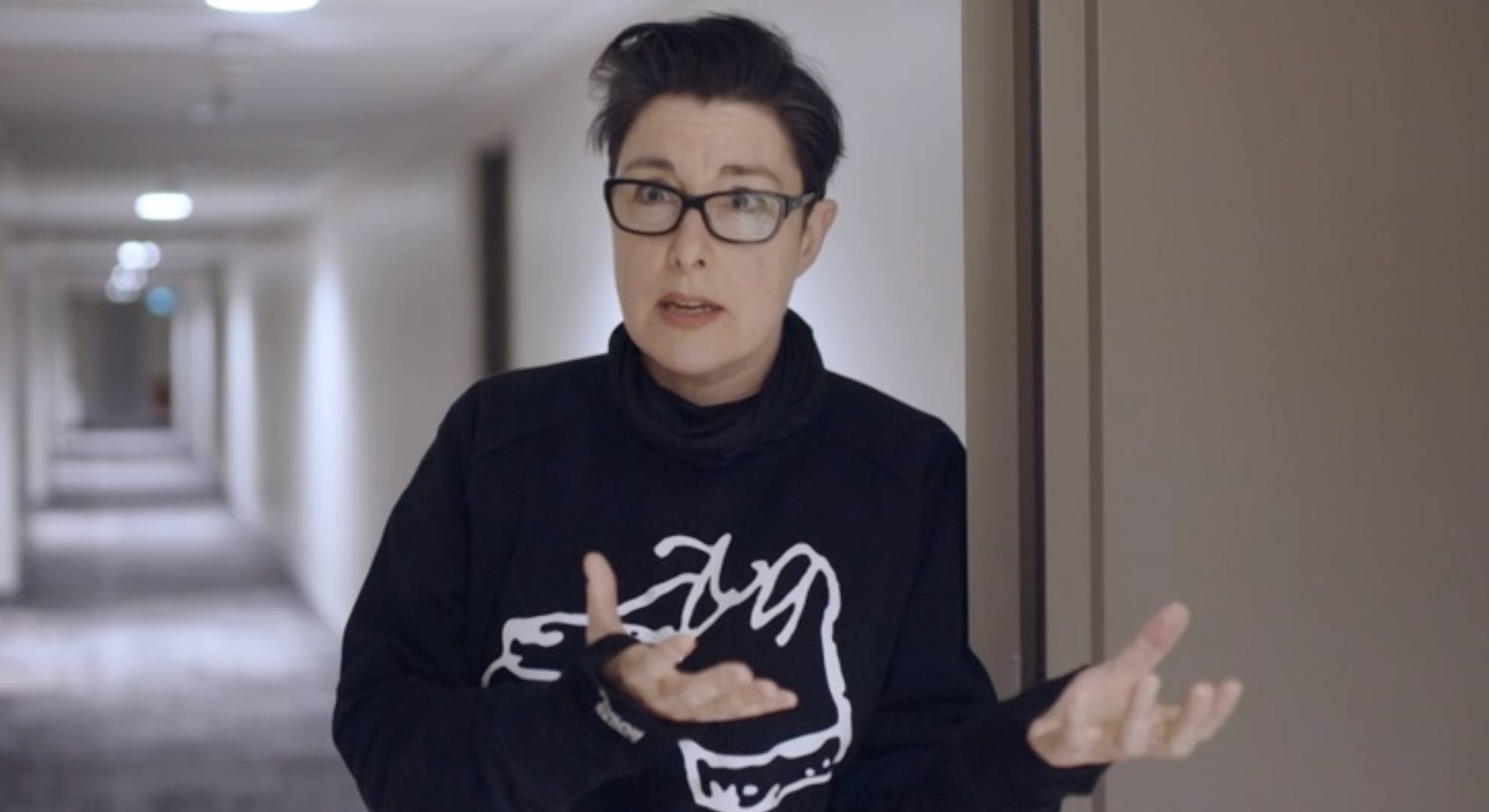 Sue Perkins gestures with her hands