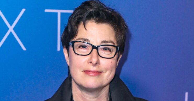 Sue Perkins smiles faintly