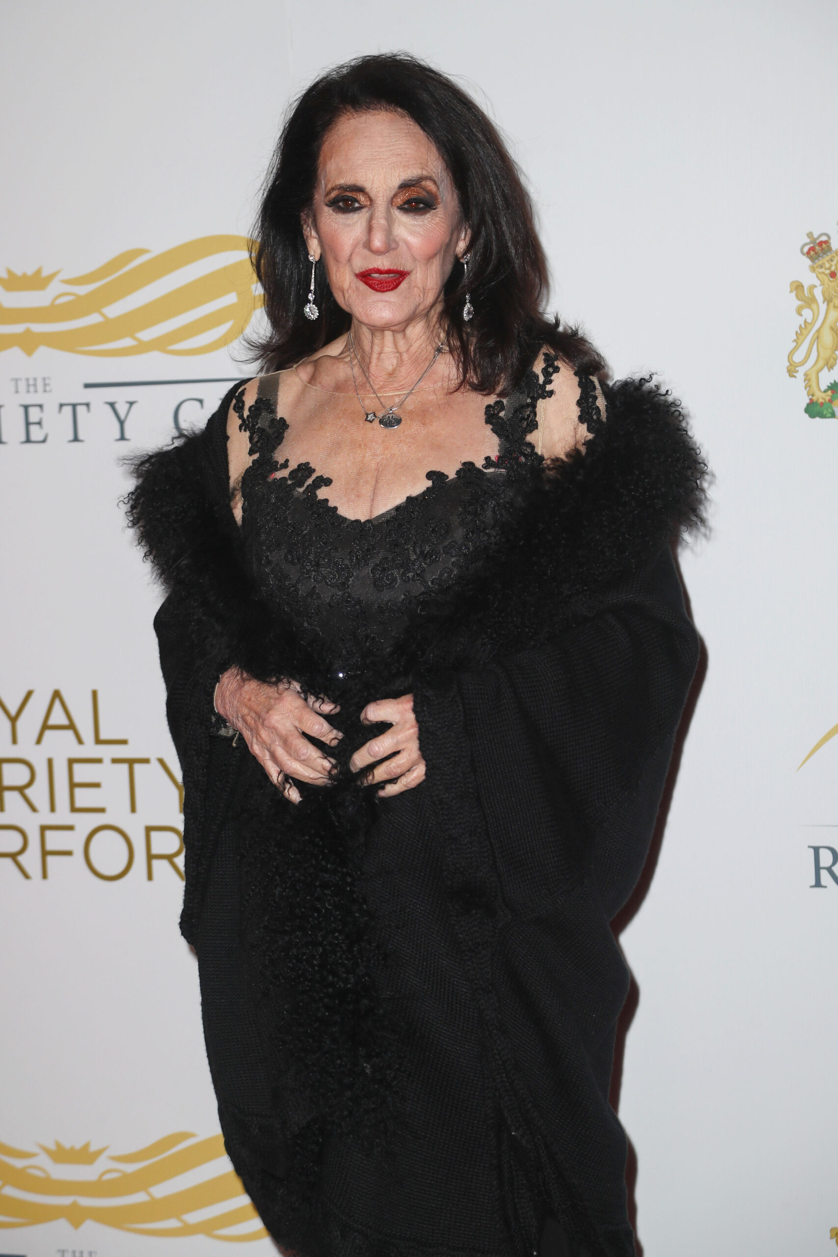 Lesley Joseph wearing a black dress on the red carpet