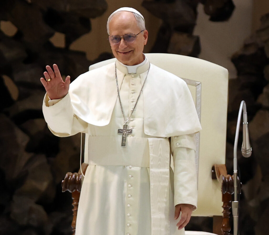 Pope Leo XIV waving during meeting