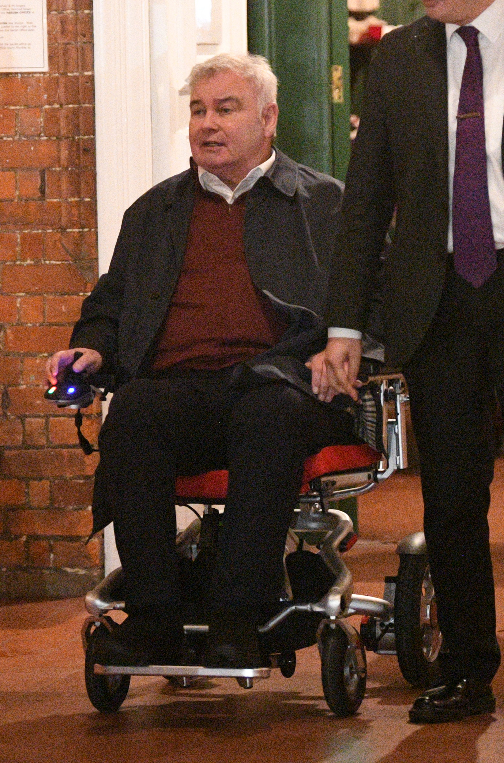 Eamonn Holmes on a wheelchair