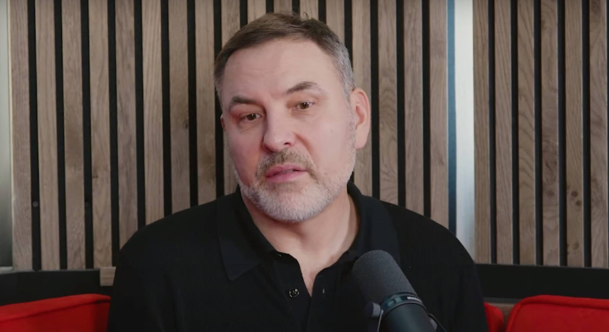 David Walliams speaks into a microphone
