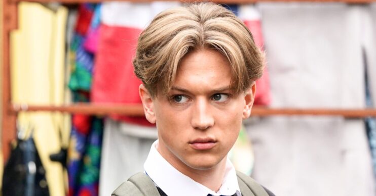 Joel looks angry on EastEnders (Credit: BBC/Composite: ED!)