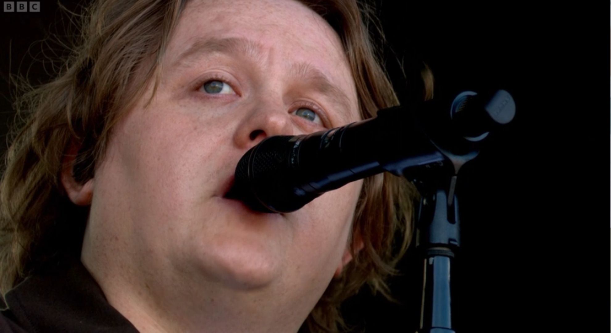 Lewis Capaldi singing at Glastonbury