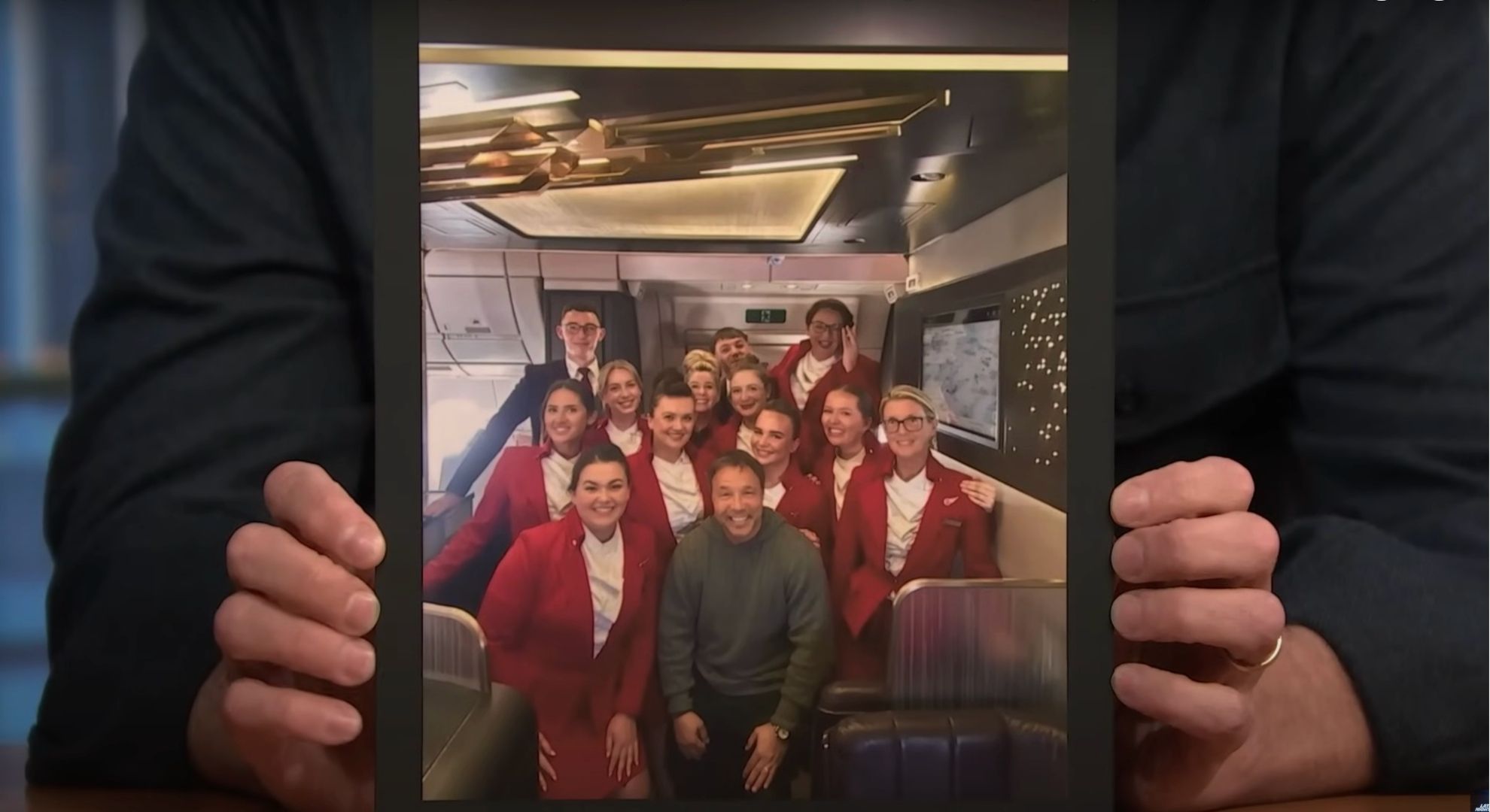 Stephen posing with cabin crew 