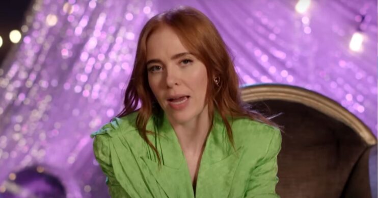 Angela Scanlon speaking to camera in a green dress