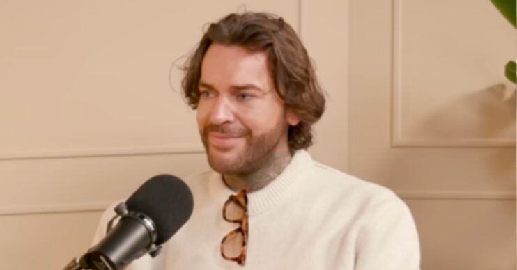 Pete Wicks smiling on podcast