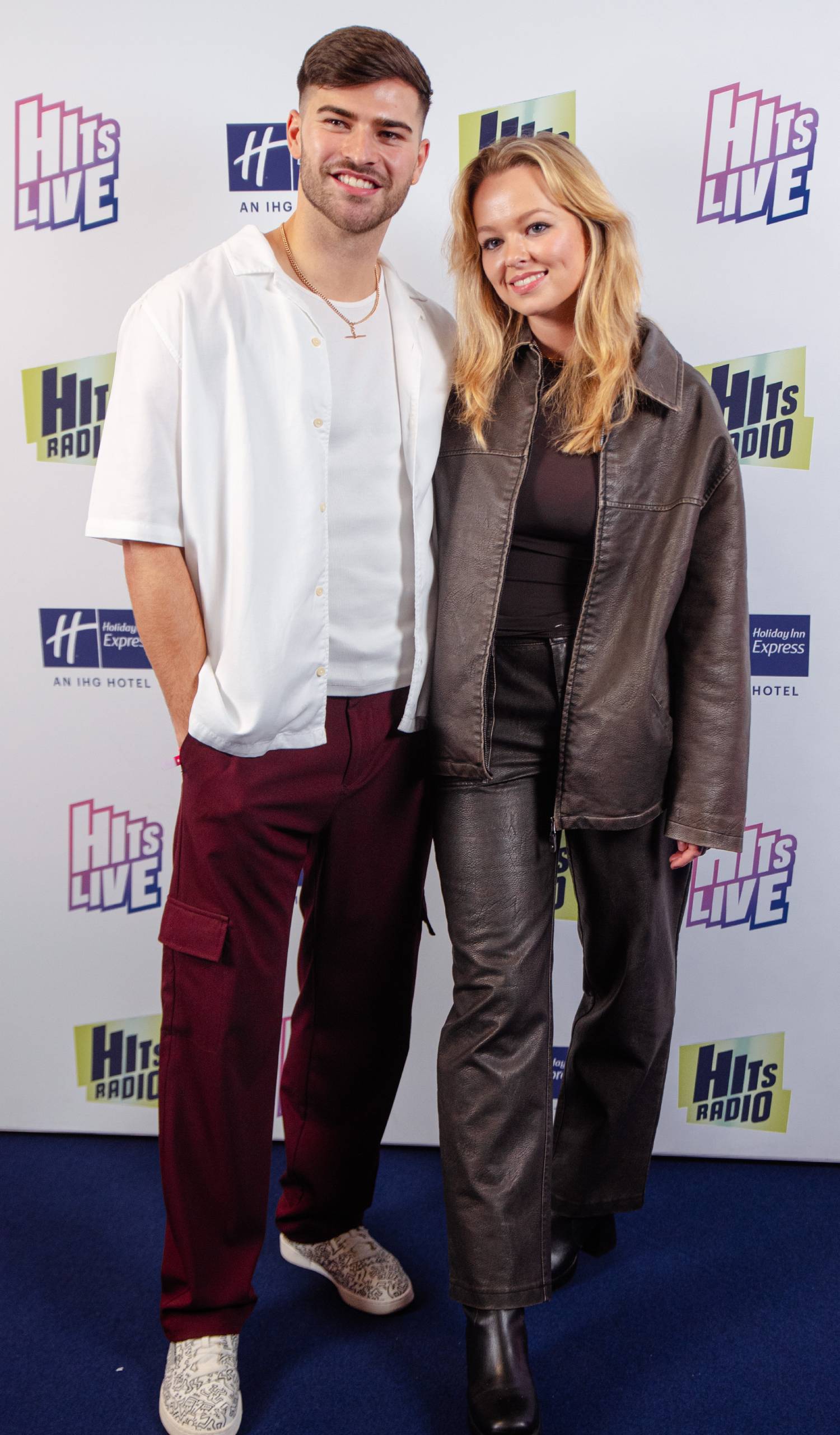 Owen Warner and Jemma Donovan pose for photos