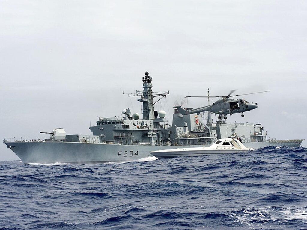 HMS Iron Duke with helicopter with Prince William on board