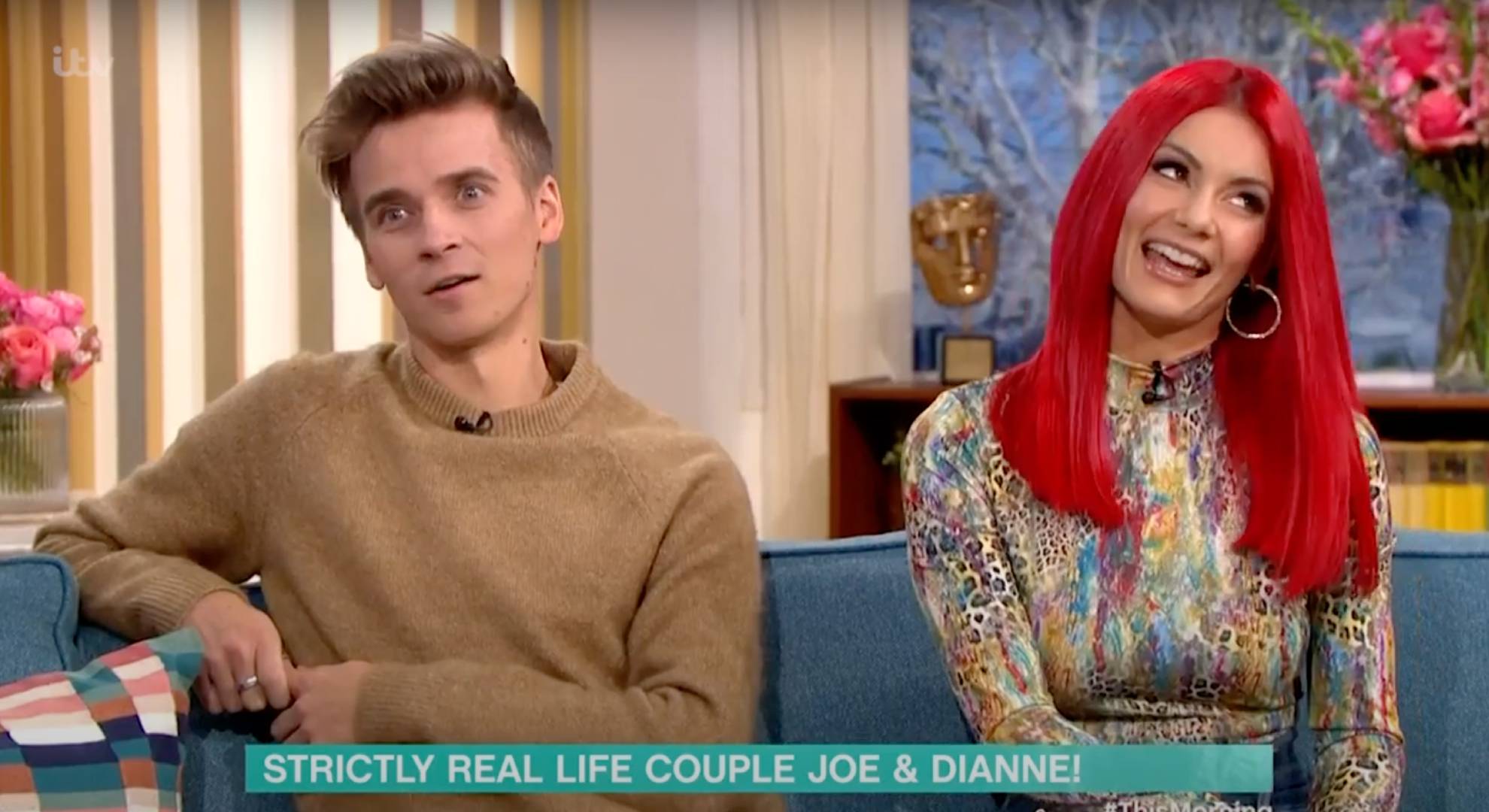 Dianne Buswell and Joe Sugg look in different directions