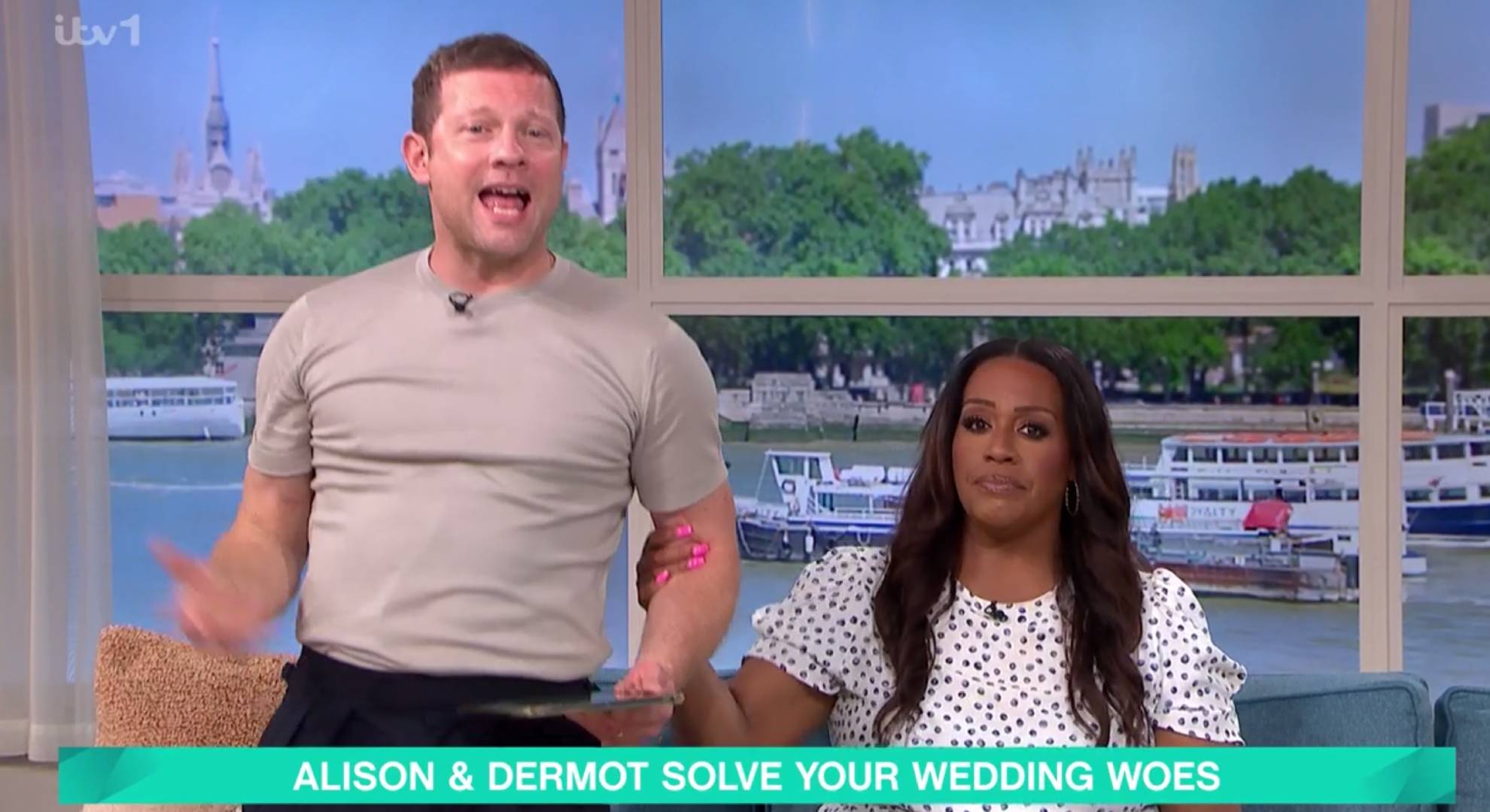 Alison Hammond pulls on Dermot O'Leary's arm