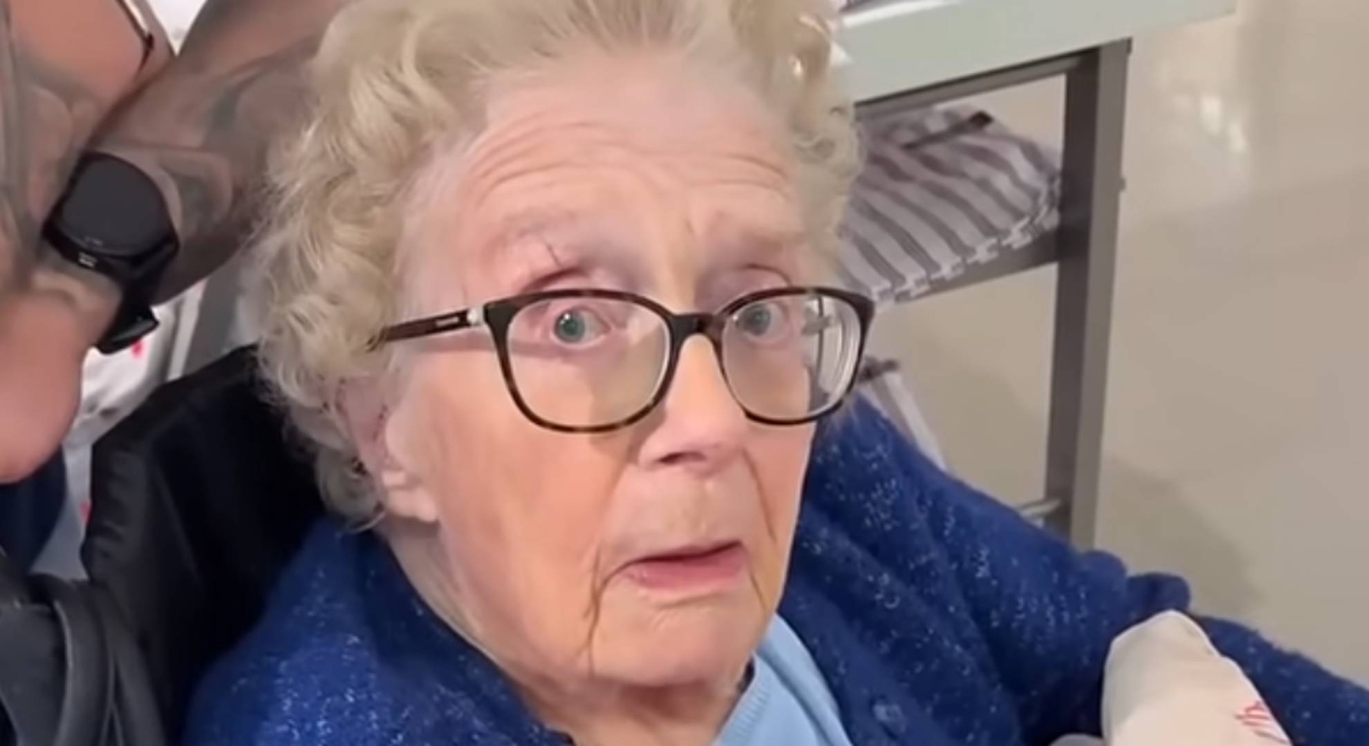 Norma looks at the camera