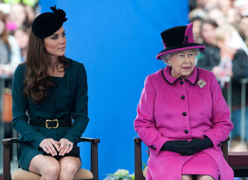 Kate Middleton sits next to Queen Elizabeth II