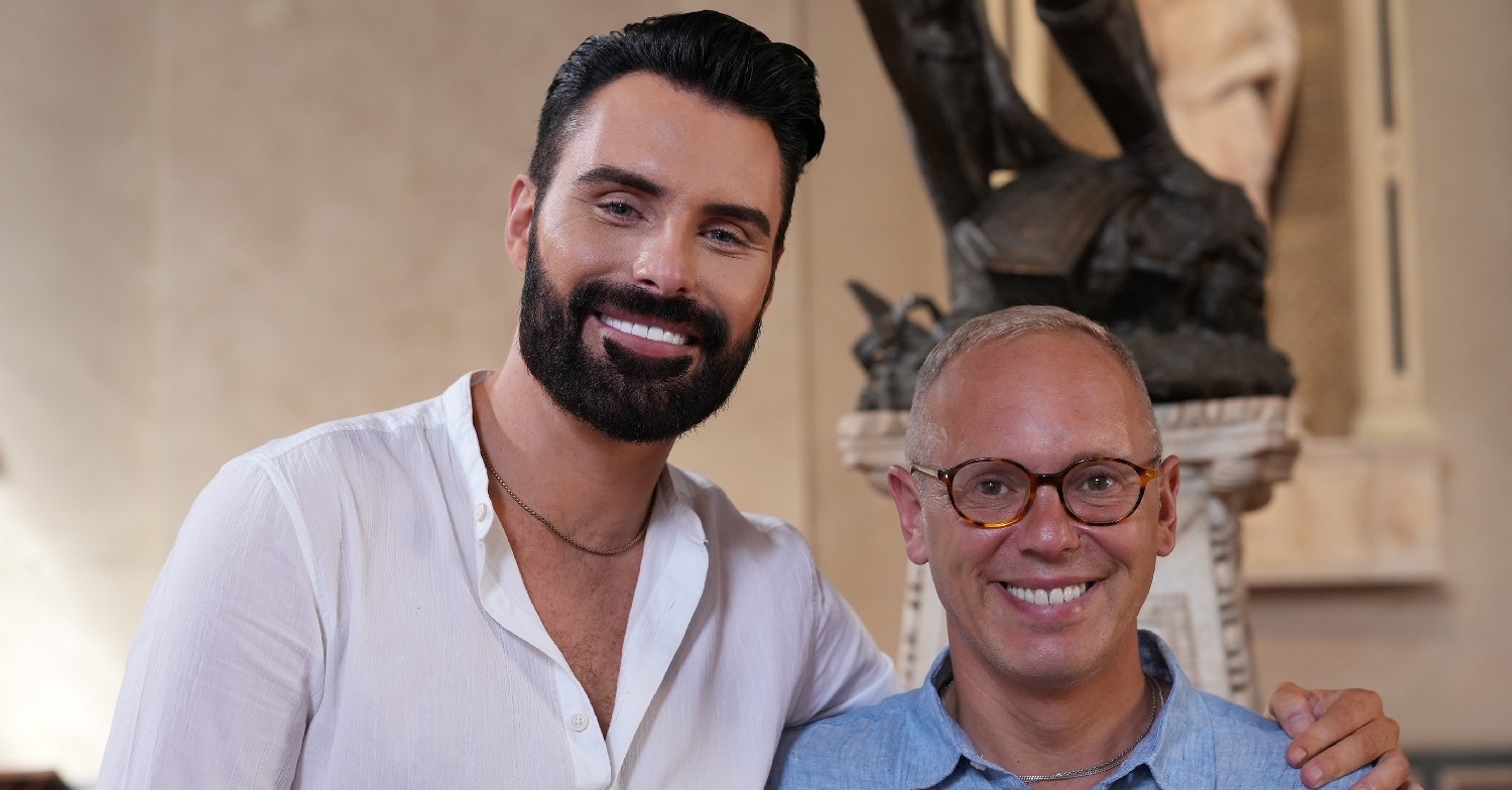 Rylan Clark and Rob Rinder smiling