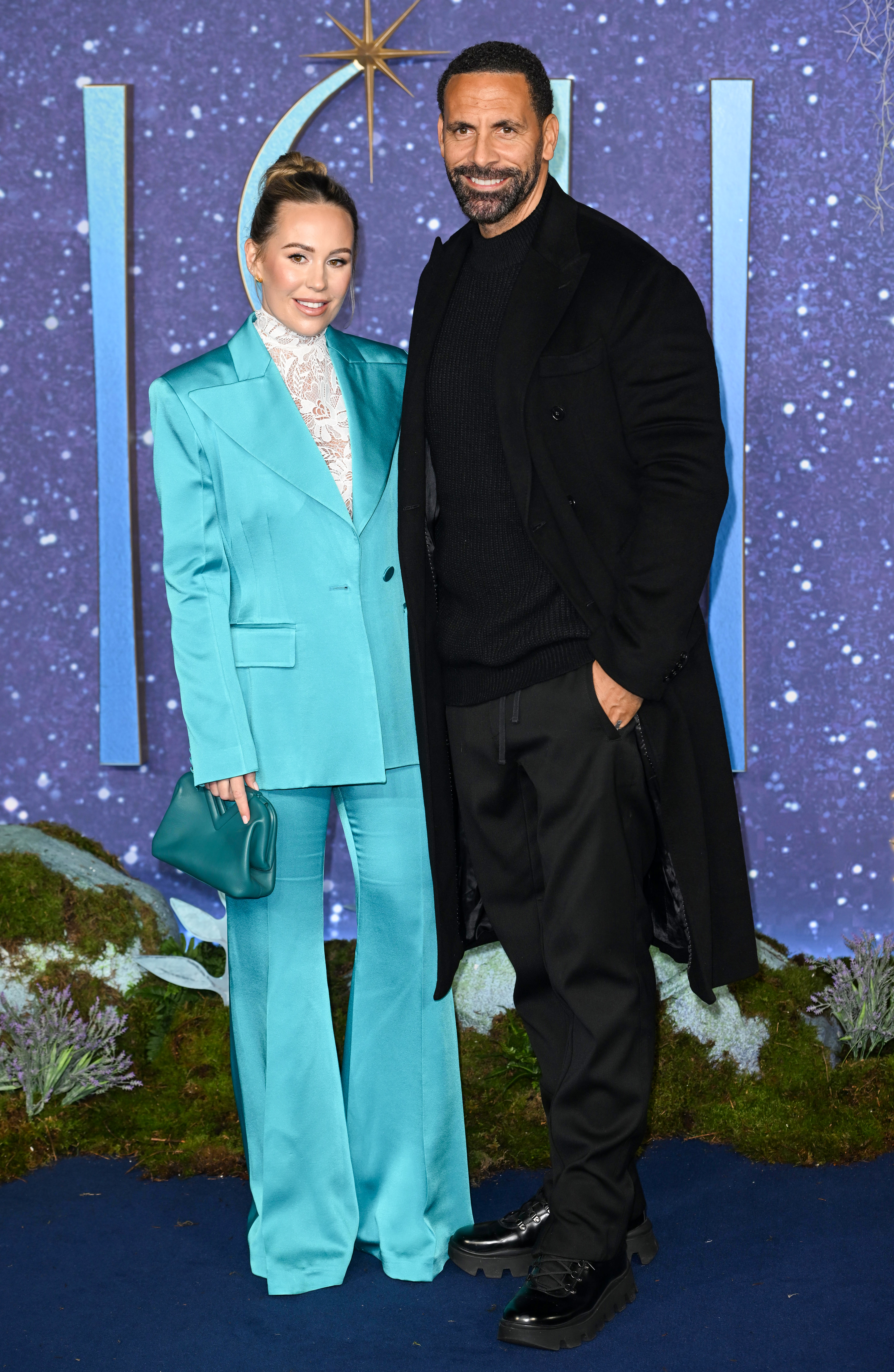 Kate and Rio Ferdinand on the red carpet of an event