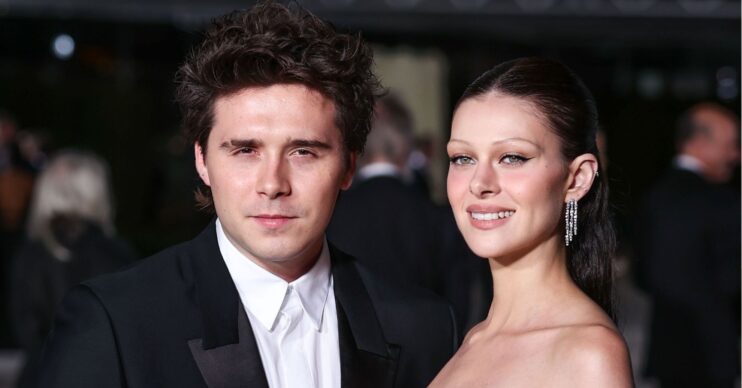 Brooklyn and Nicola Beckham at event