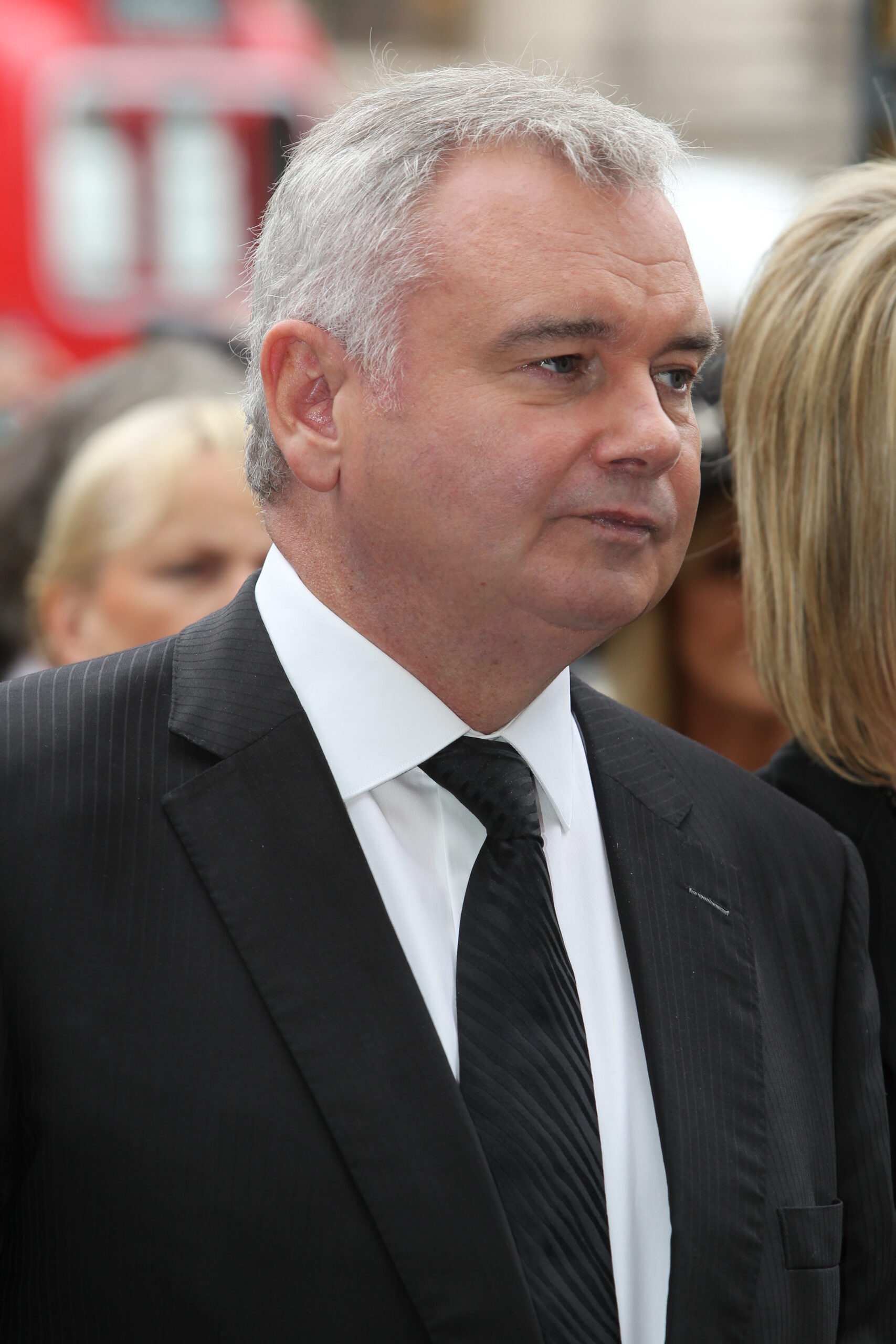 Eamonn Holmes in black suit