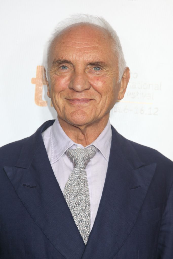 Terence Stamp smiling at event