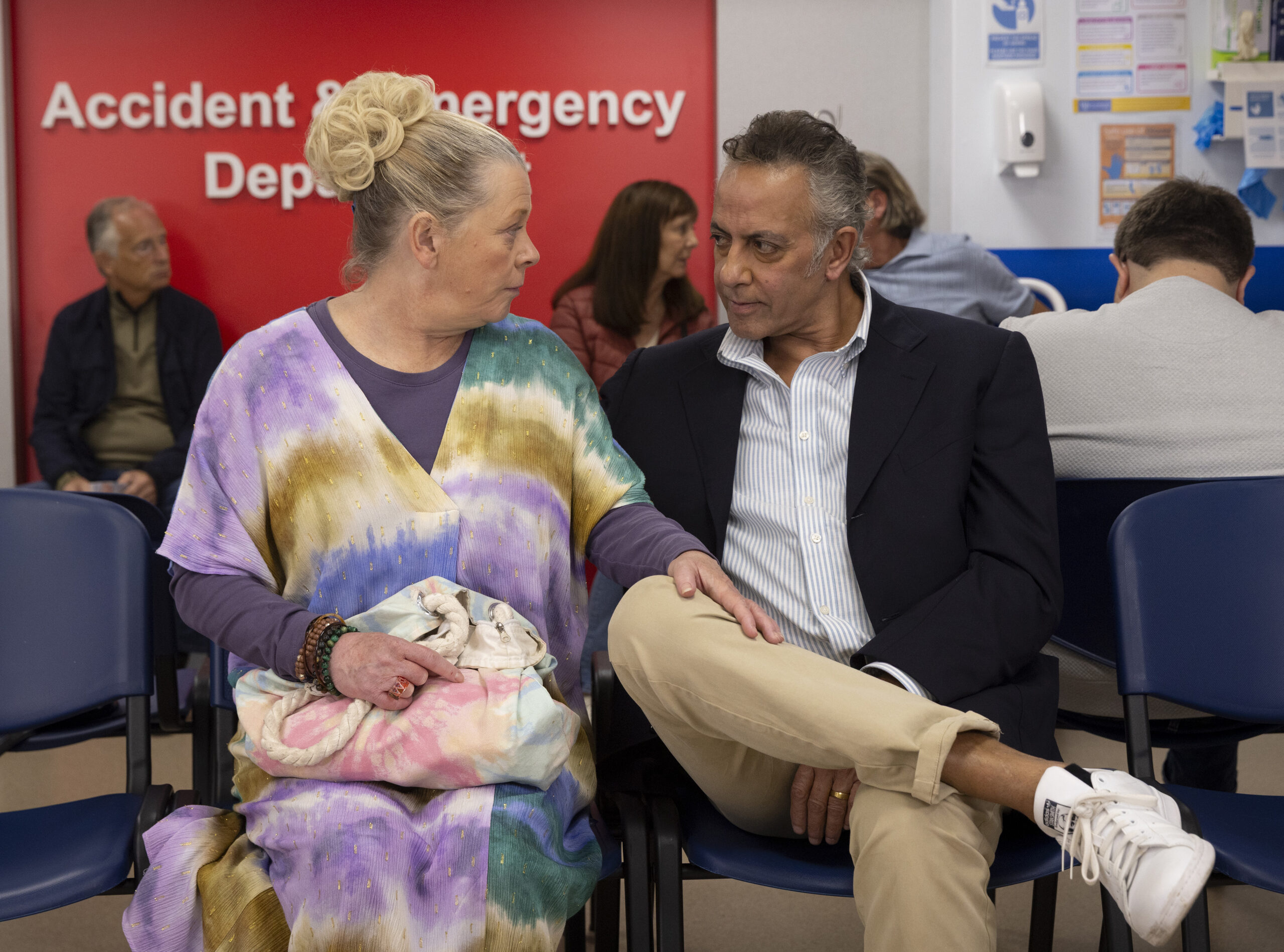 Coronation Street's Bernie and Dev waiting at the hospital