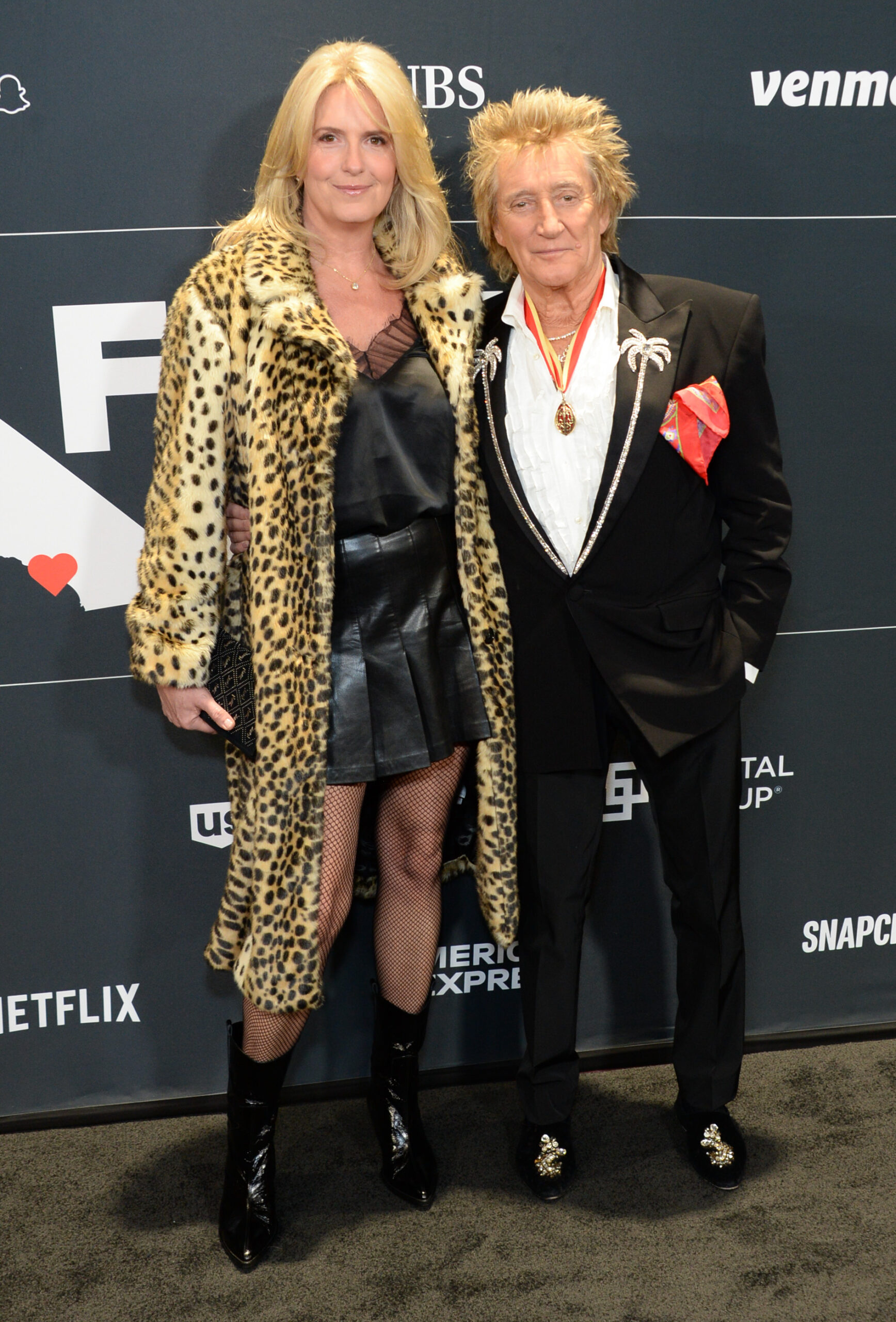 Penny Lancaster and Rod Stewart at event 