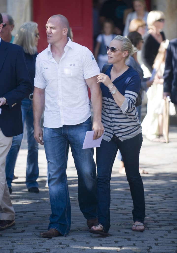 Zara and Mike Tindall walk hand in hand