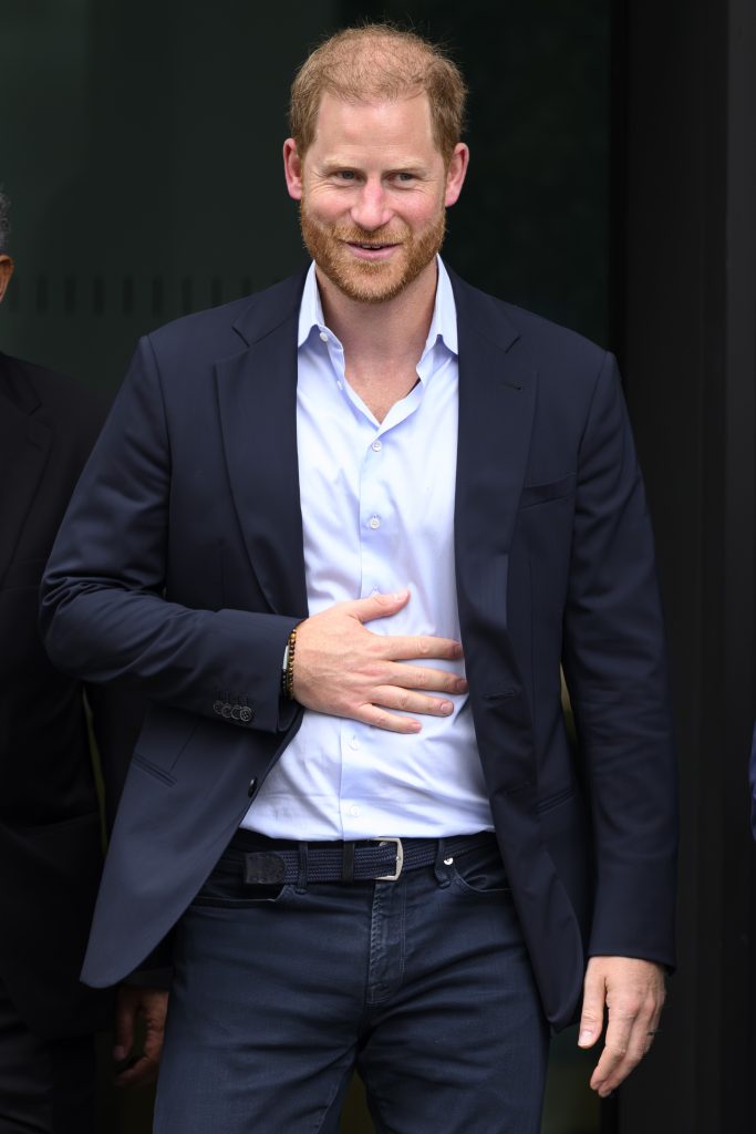 Prince Harry walking in suit