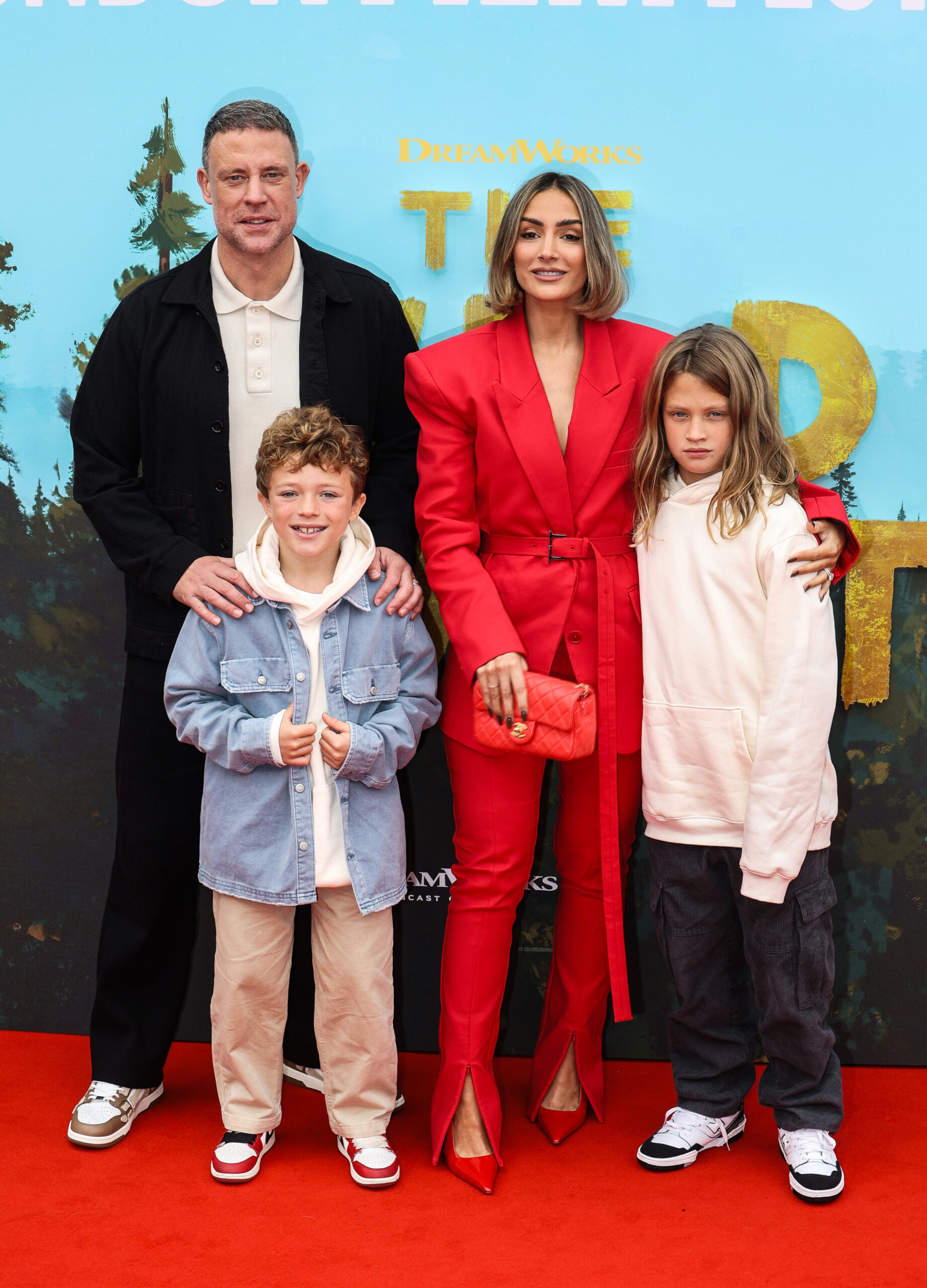 Frankie and Wayne Bridge with their children at event