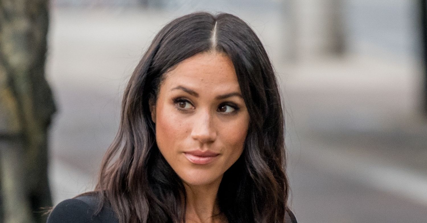Meghan Markle looking to the side