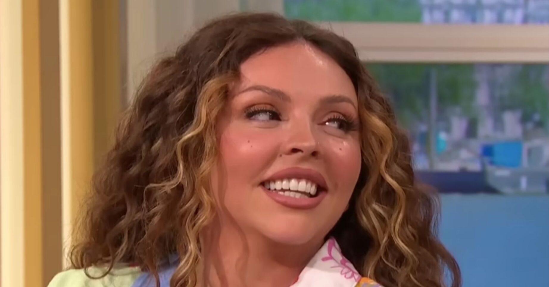 Jesy Nelson smiling