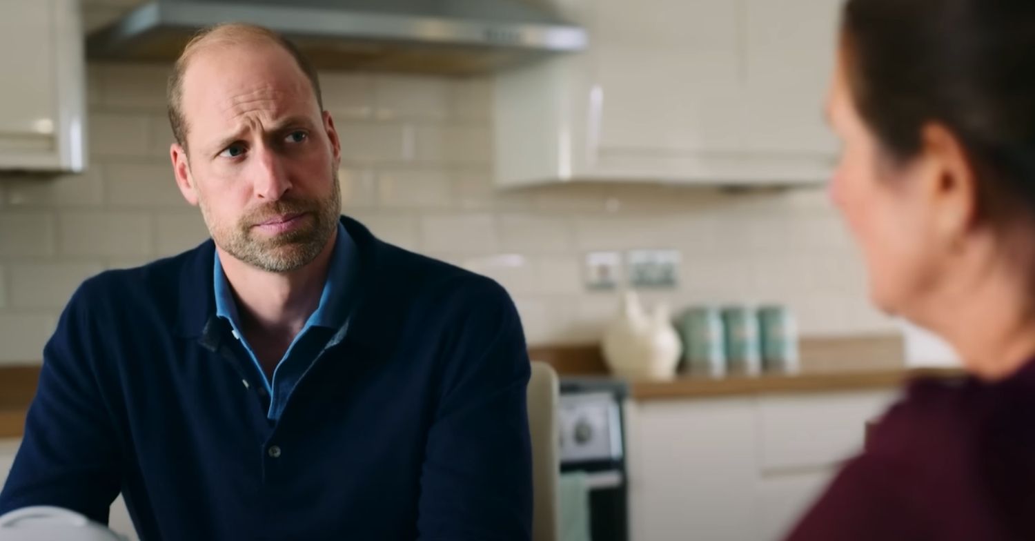 Prince William looks sad as he speaks to Rhian Mannings about her husband's suicide