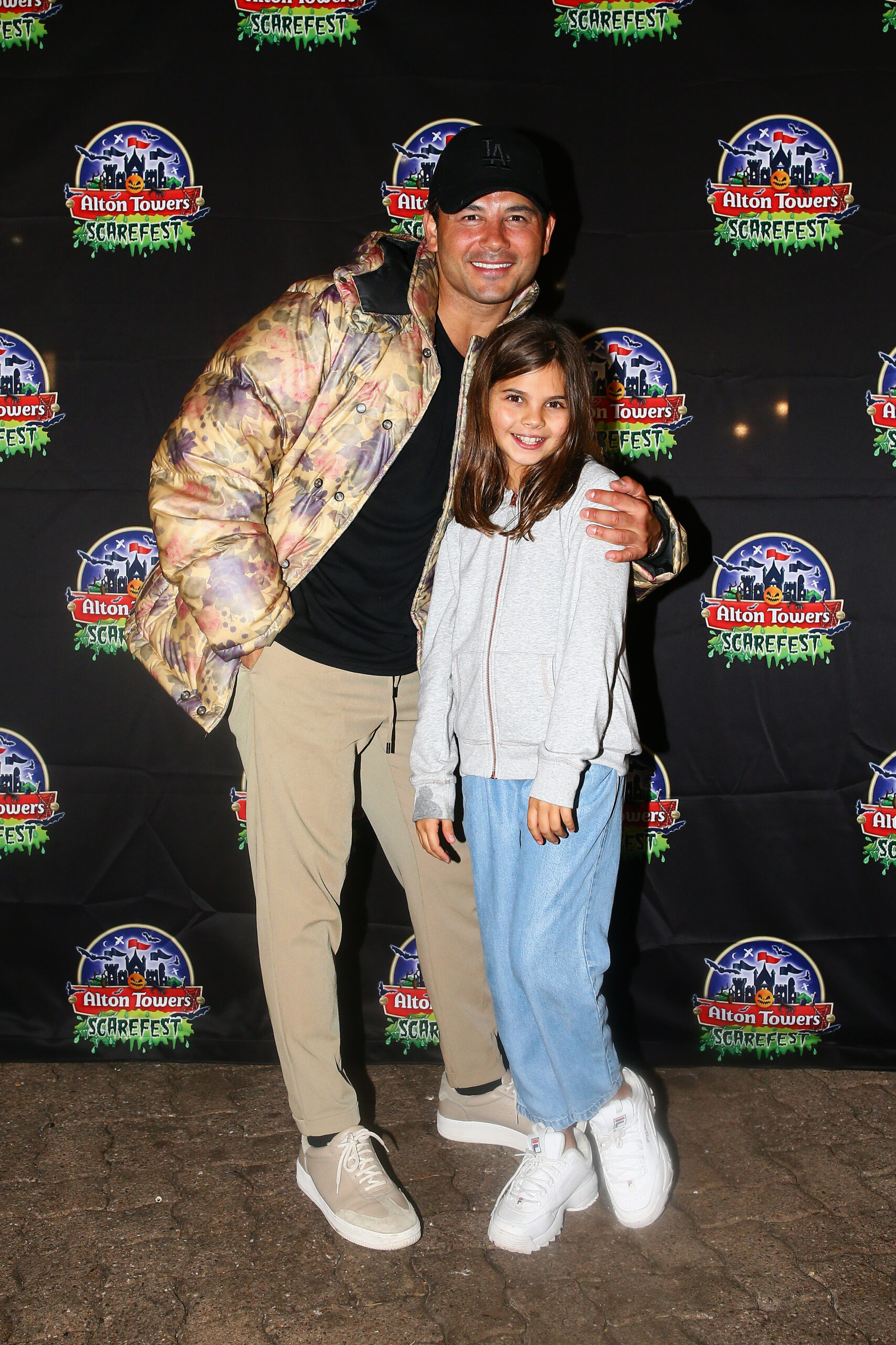 Ryan Thomas and Scarlett at an event