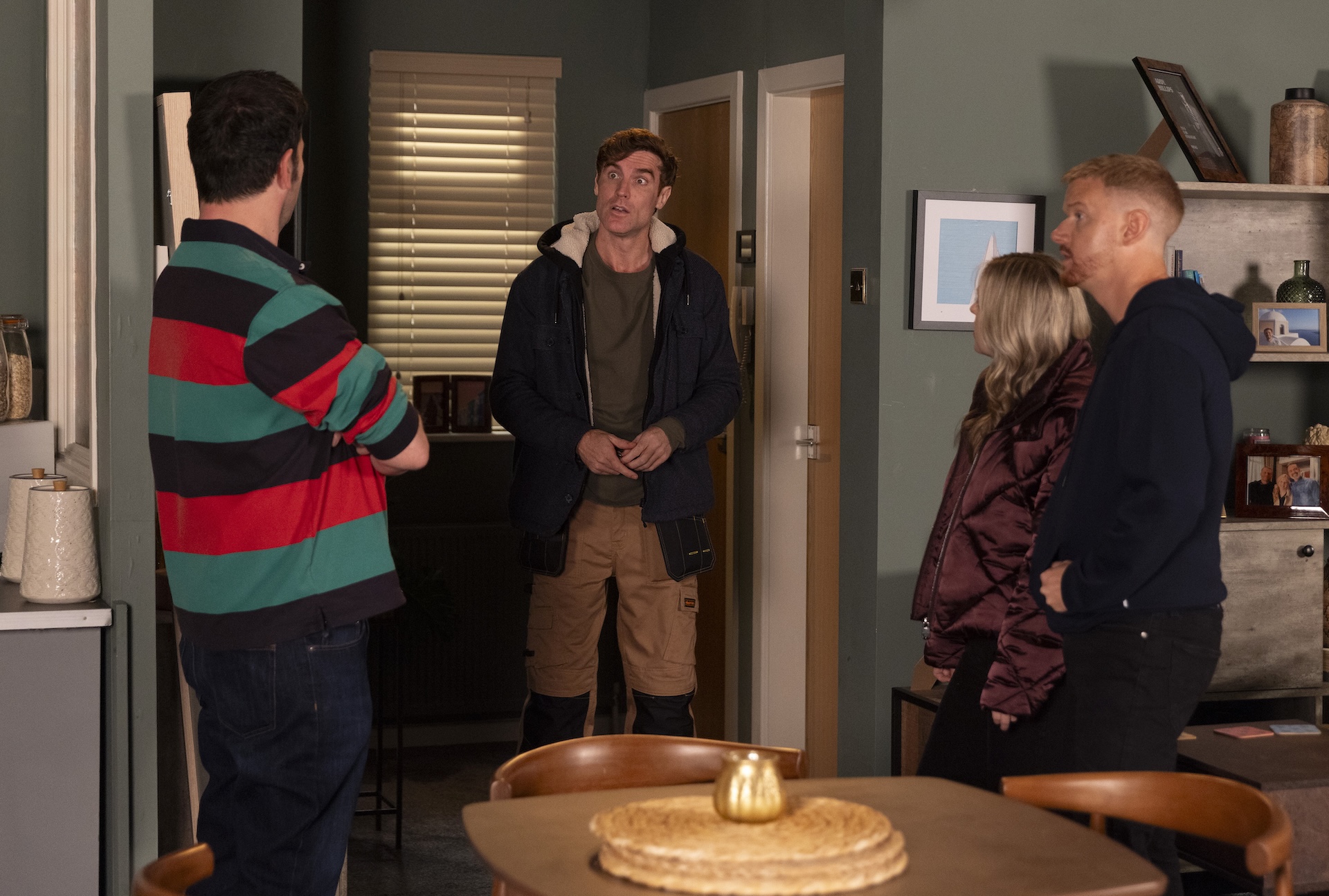 Ben, Theo, Summer and Gary talking in the flat