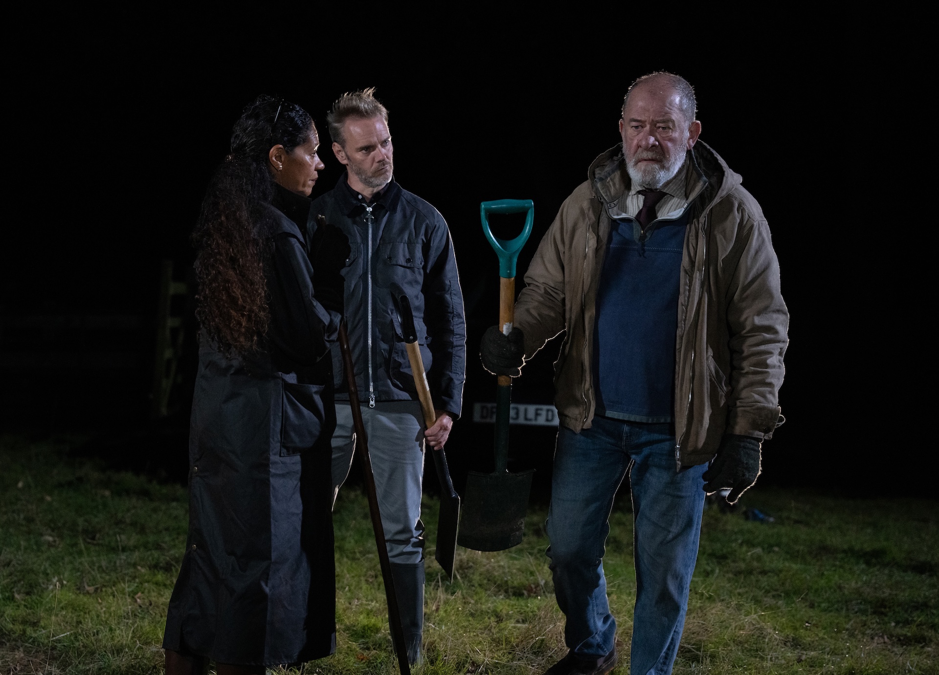 Bear is given a spade by Celia and told to dig a grave (Credit: ITV)