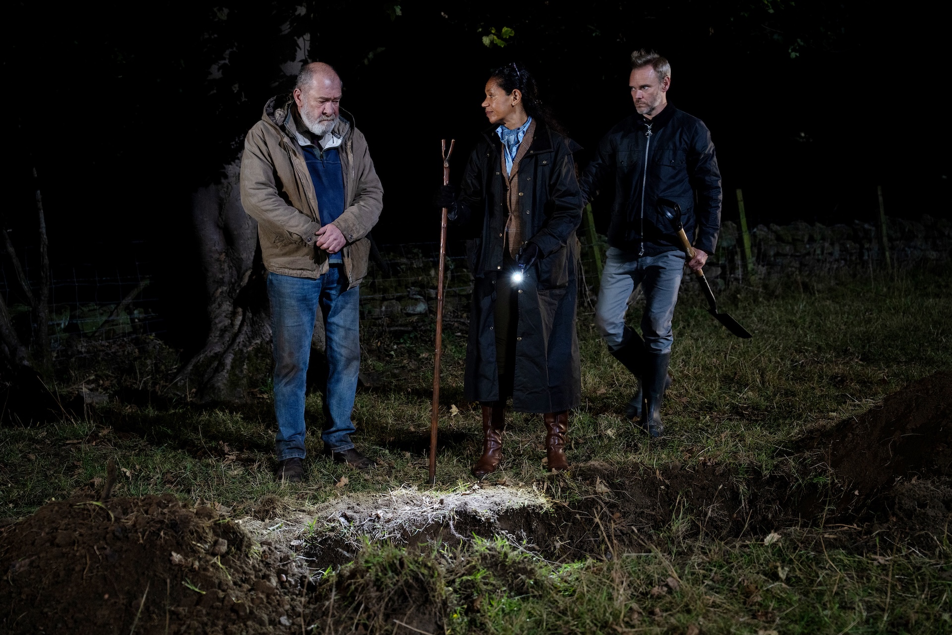 Celia forced Bear to dig Anya's grave 