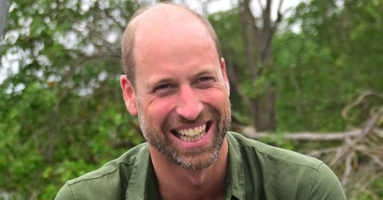 Prince William smiling in green shirt in Brazil
