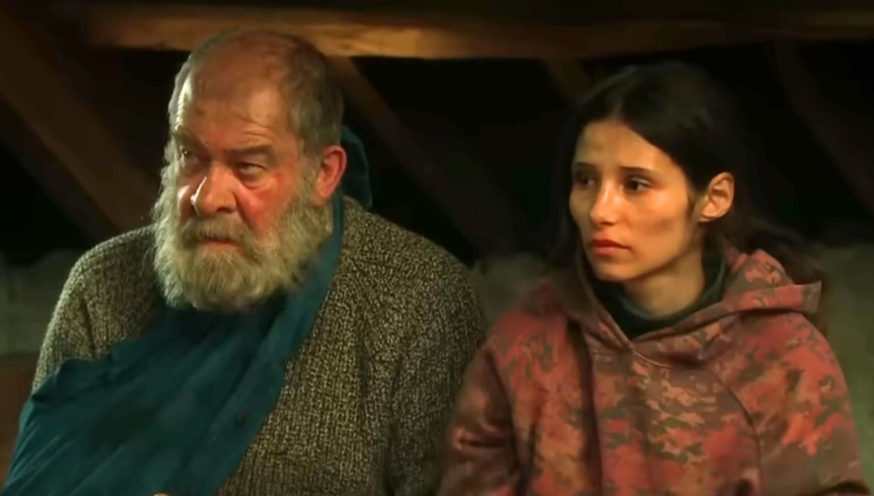 Bear and Anya sit together in the room 