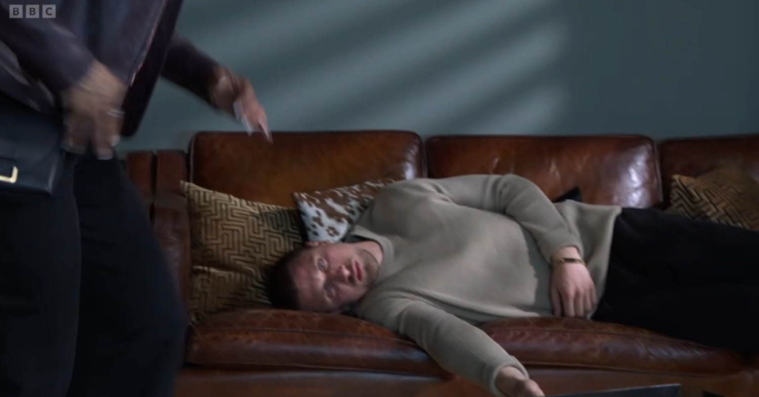 Harry passed out on the sofa in EastEnders