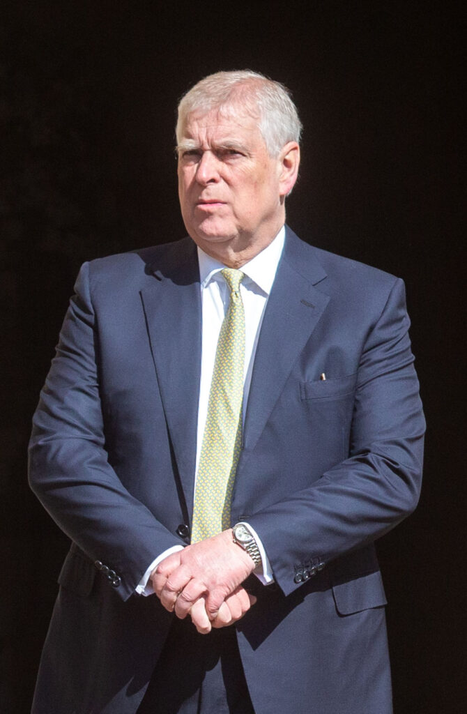 Andrew Mountbatten-Windsor walking in suit