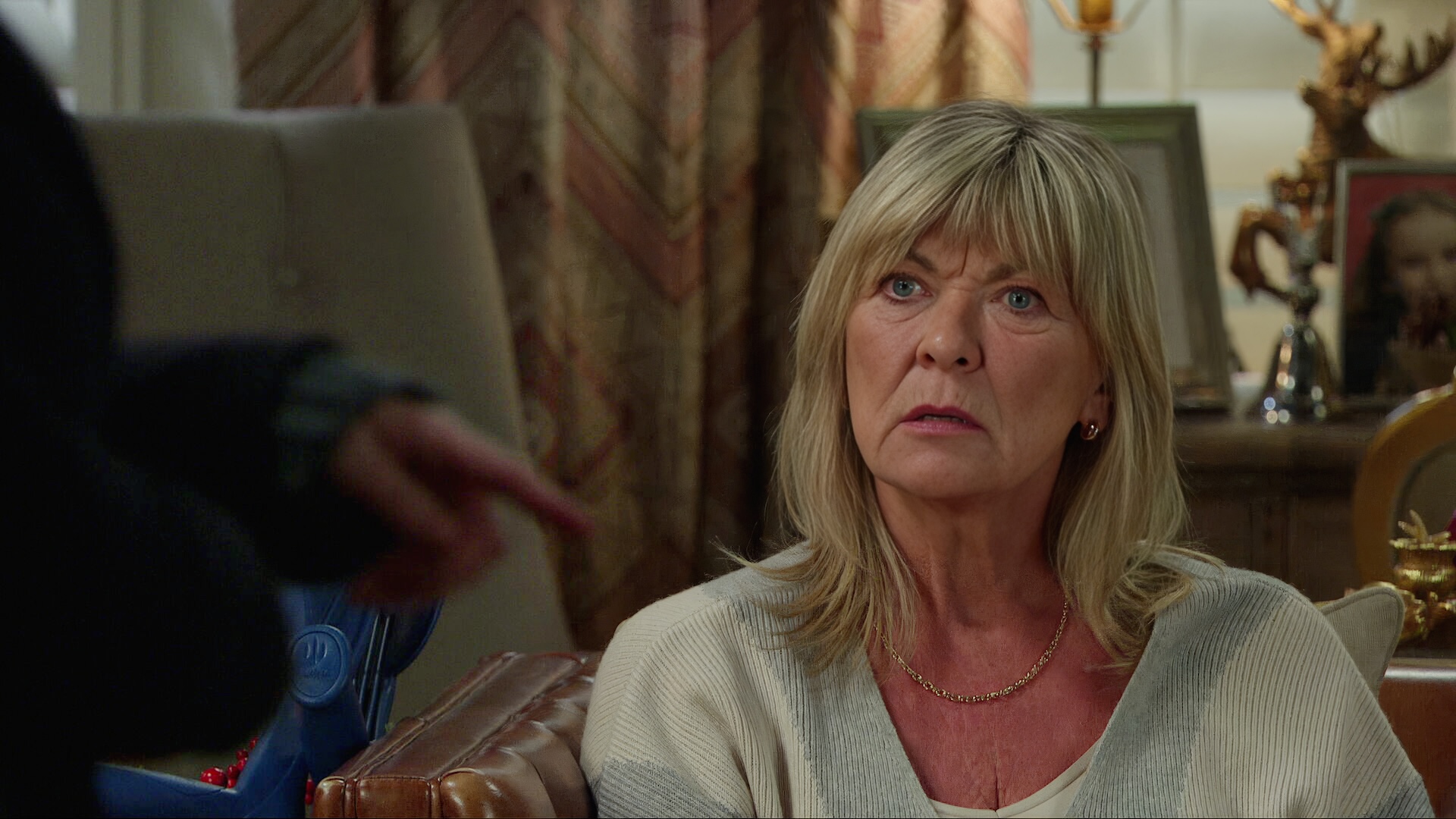 Kim looks shocked in Emmerdale