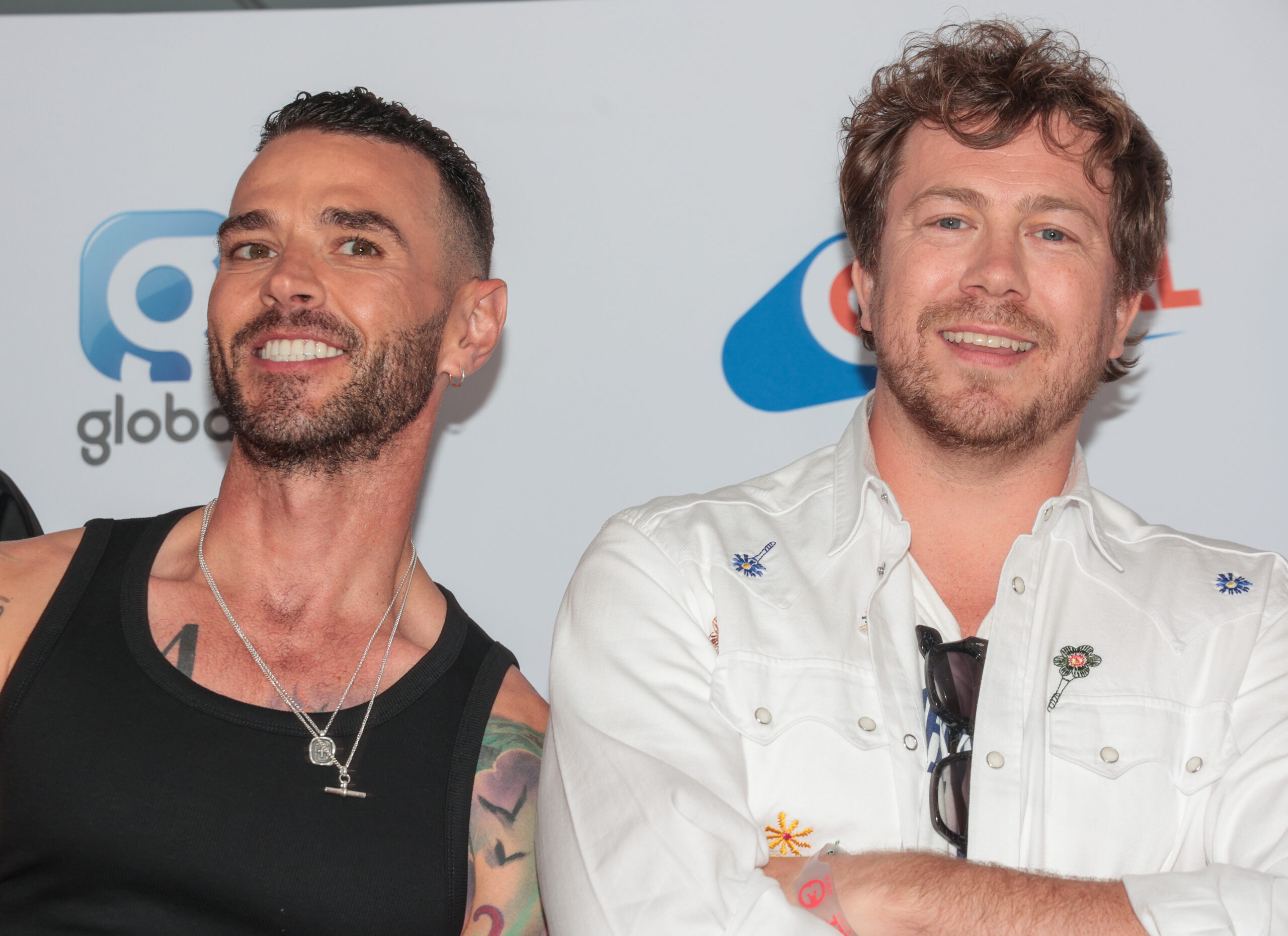 Matt Willis and James Bourne at an event 